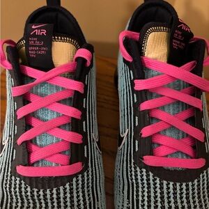 Nike Air Sneakers with Turquoise and Pink Accents